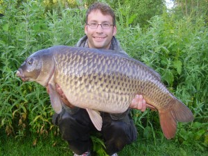 A cracking 31lb 4oz Common from Heron caught by Clark White