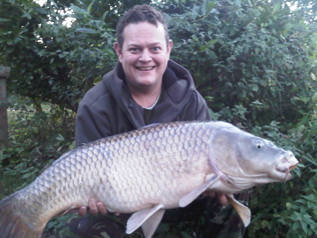 Dan Bourne with a PB 29lb 5oz Common from 'The Monk' in Heron caught October 2012