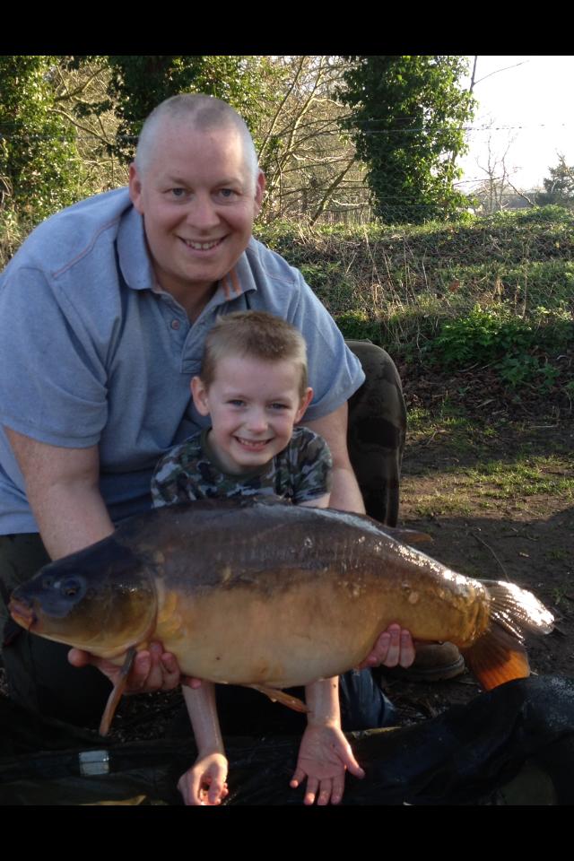 Young Alfie Howells with his first Broadwing carp of 2014 a nice 23lb mirror (Dont worry Dad i am sure you'll catch one soon!)