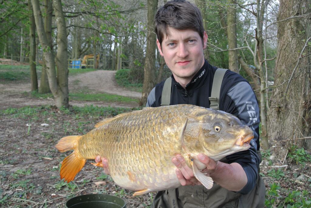 James Bygrave with a 21lb 12oz ghost carp from Heron