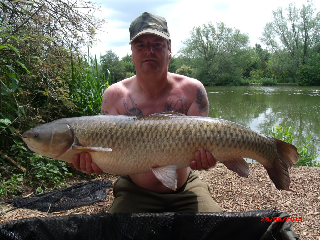Mr Youngman with his 25lb grass carp from Heron