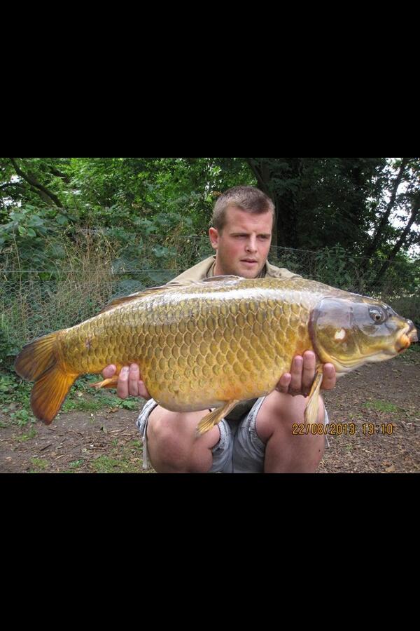 Andy Lewis with a 23lb 12oz ghost carp