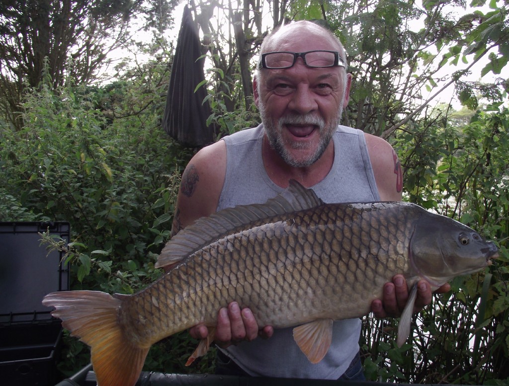 Woody with a PB 21lb 8oz common from Heron