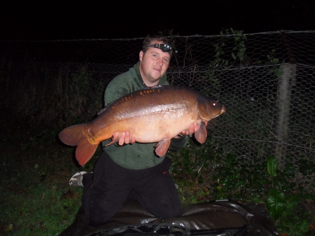 Chris Flanders with a 21lb 2 oz mirror from Broadwing