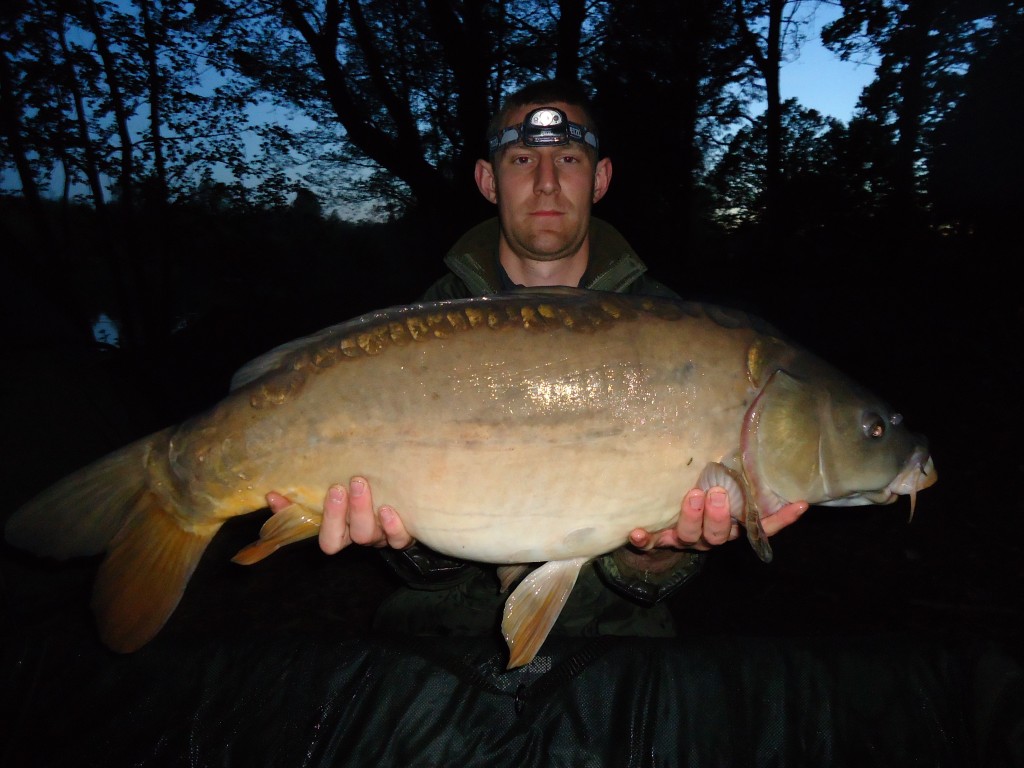 Julian Foster with a 25lb mirror from Heron