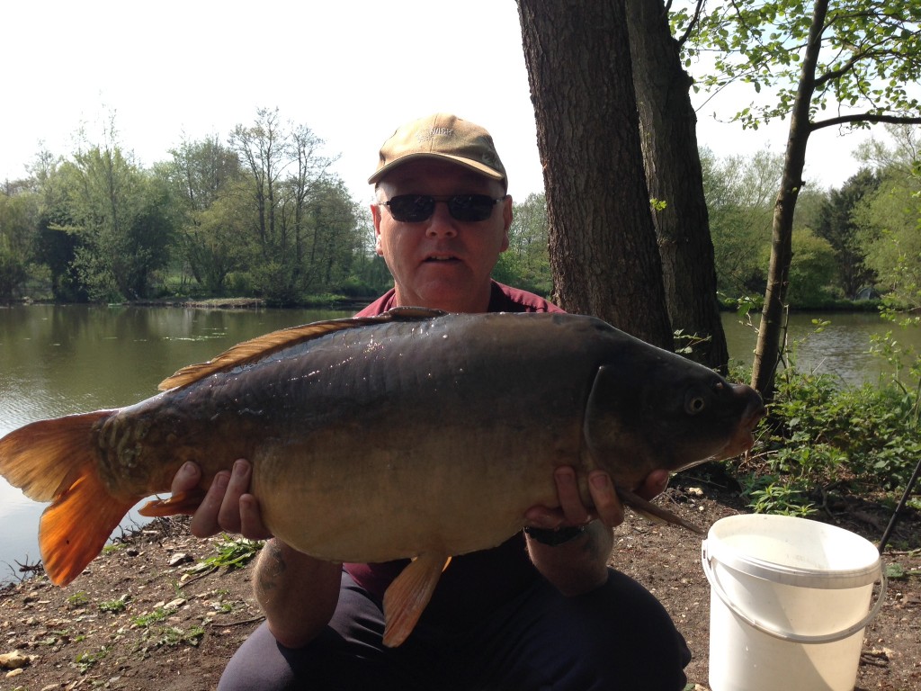 Eric Stamford with a 20lb 8oz mirror from Heron, part of a 4 X 20lb + haul