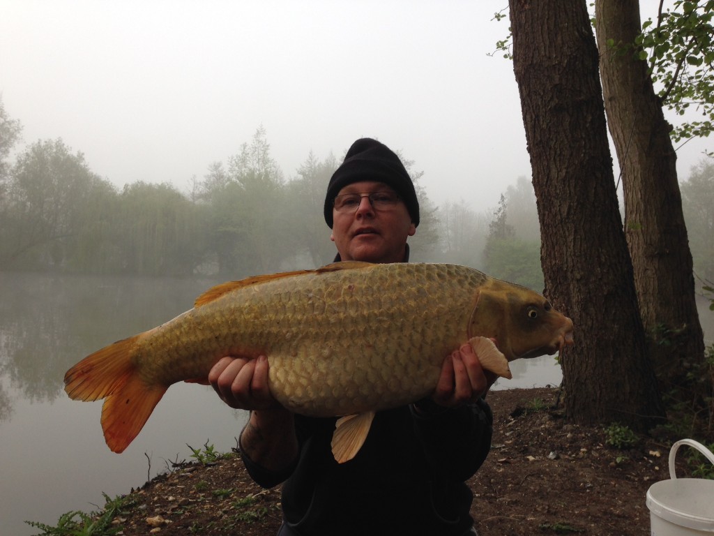 Eric Stamford with a 20lb 8oz ghost carp from Heron, part of a 4 X 20lb + haul