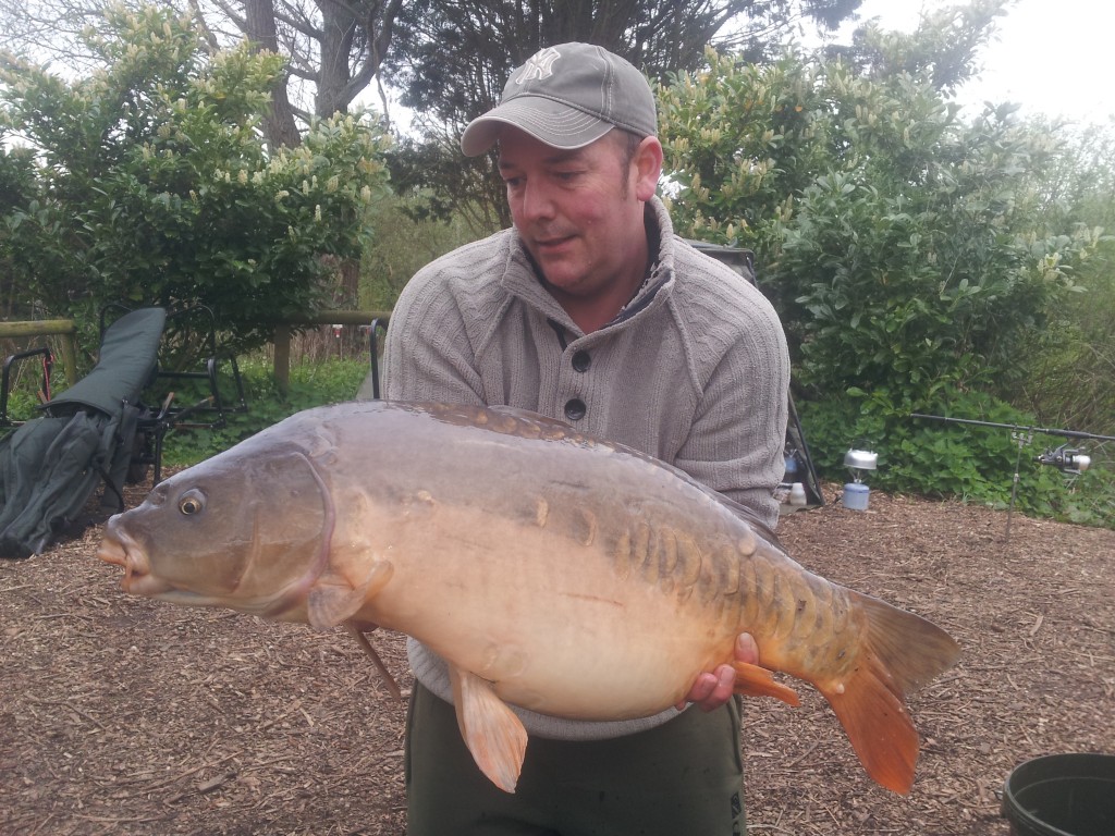 Gary Bowles with a 25lb mirror from Heron