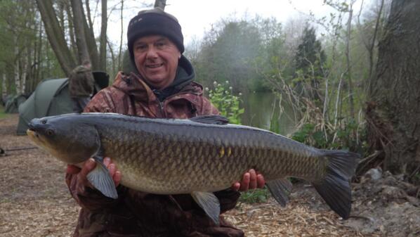Steve Ames with a 27lb grass carp from Broadwing.