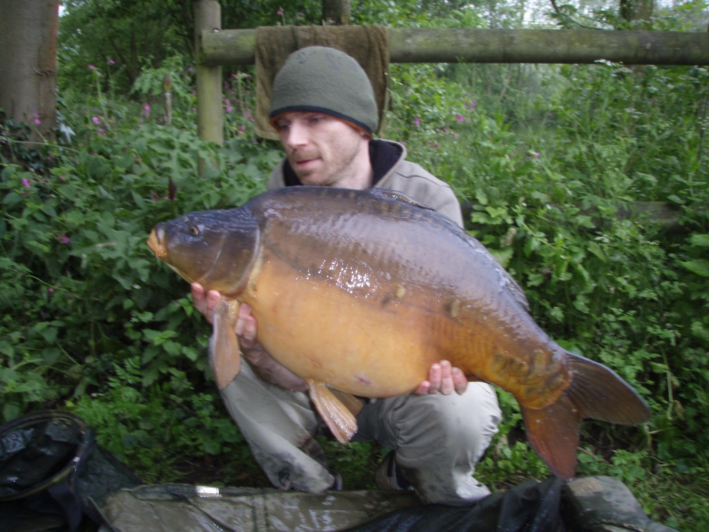 Kev Smith with a chunky 25lb 4oz mirror from Broadwing