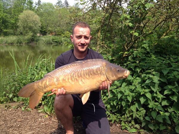 Carl McKail with a 23lb 4oz mirror from Heron part of an 8 fish haul