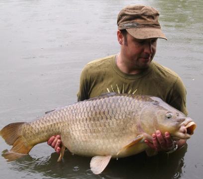 Dale Capps with a PB 36lb 2oz common from Heron