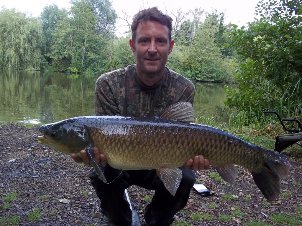 steve cudden with a heron grassie at 21lb 4oz caught on the surface