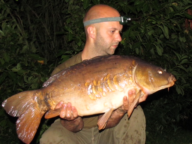 James Stickland with a 21.13oz mirror from Heron lake